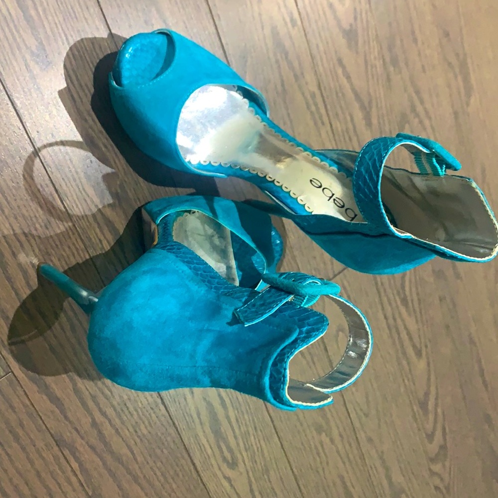 Blue suede heels.
